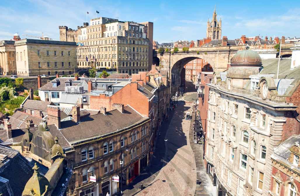 An elevated view of a historic Newcastle city center street representing ProFM commercial security service areas
