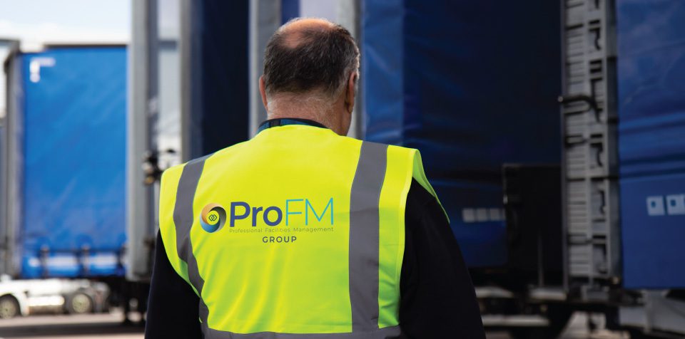 ProFM Group security officer carrying out site security patrols at a commercial facility as part of a long-term fire watch and security contract.